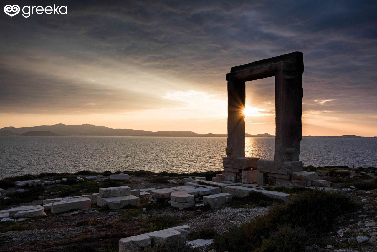 Portara at sunset, the remains of the temple of Apollo on Palatia Islet of Chora