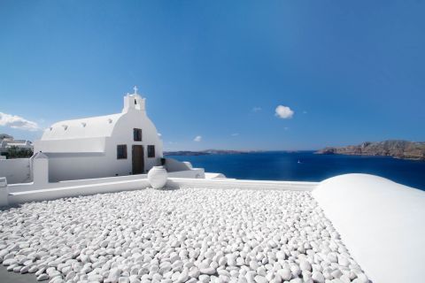 White chappel in Oia and seaview