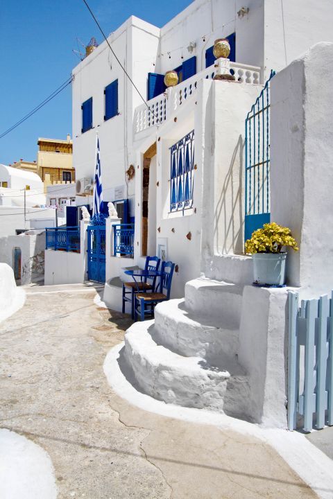 Cycladic architecture with white and blue building in Pirgos