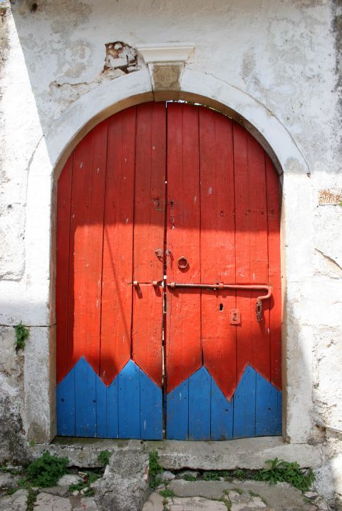 An eye-catching wooden door in Liapades