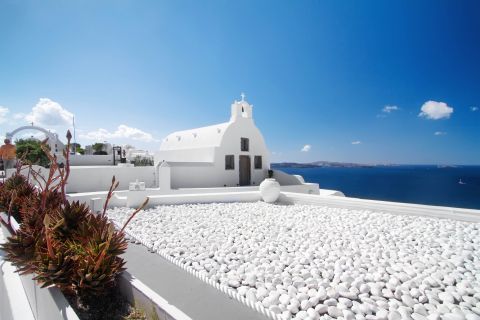 A small whitewashed chapel in Santorini