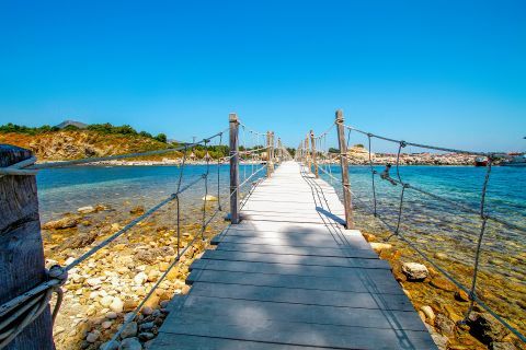 Agios Sostis: Walking on the wooden bridge that connects the bay of Laganas with Agios Sostis islet.